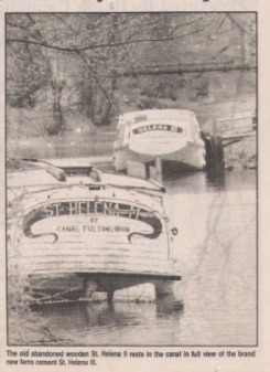 Until it could be decided what to do with her, the II sat along the very edge of the canal that she had been conceived on